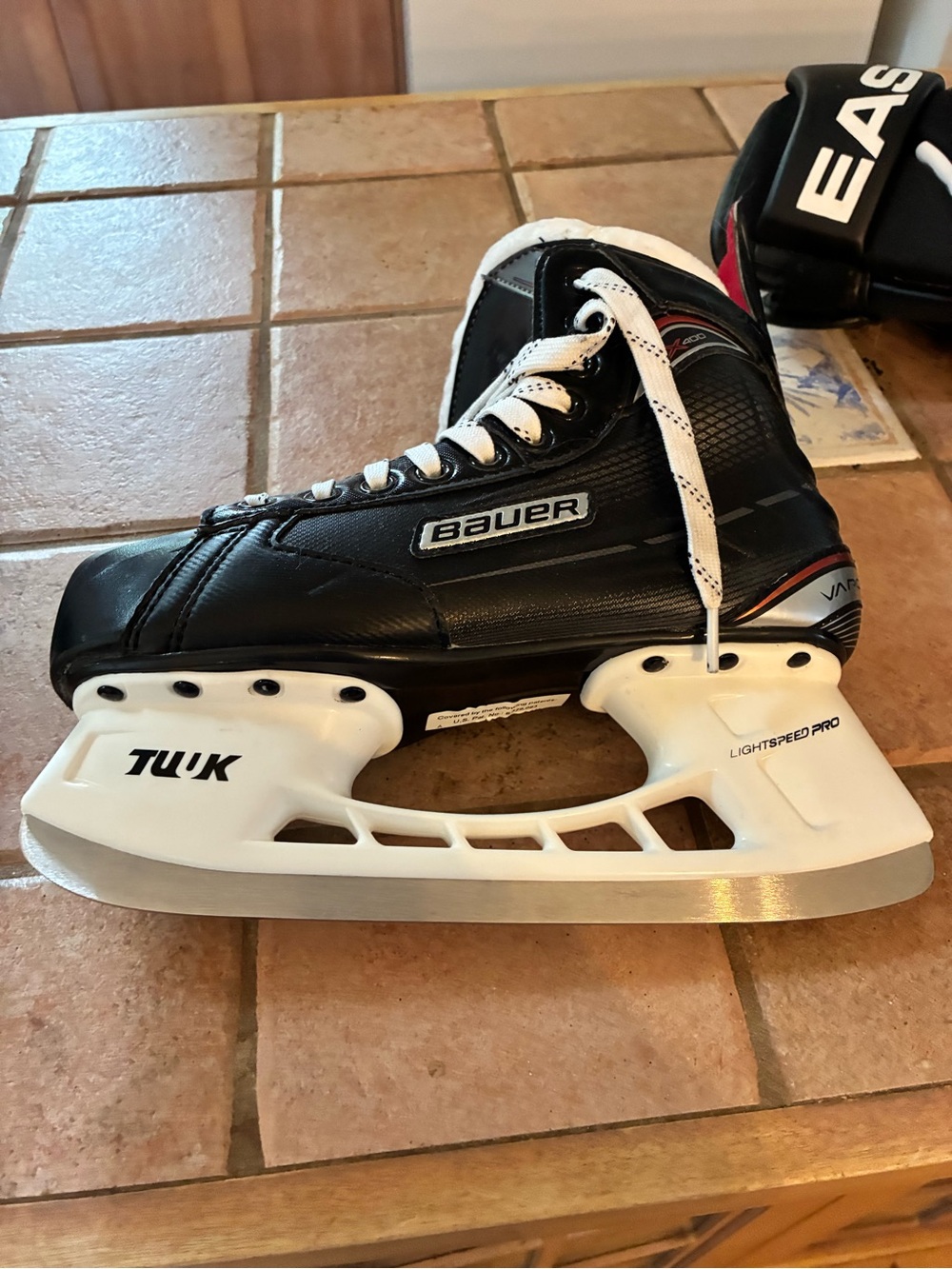 Bauer Black Hockey Skate with White TUUK blade